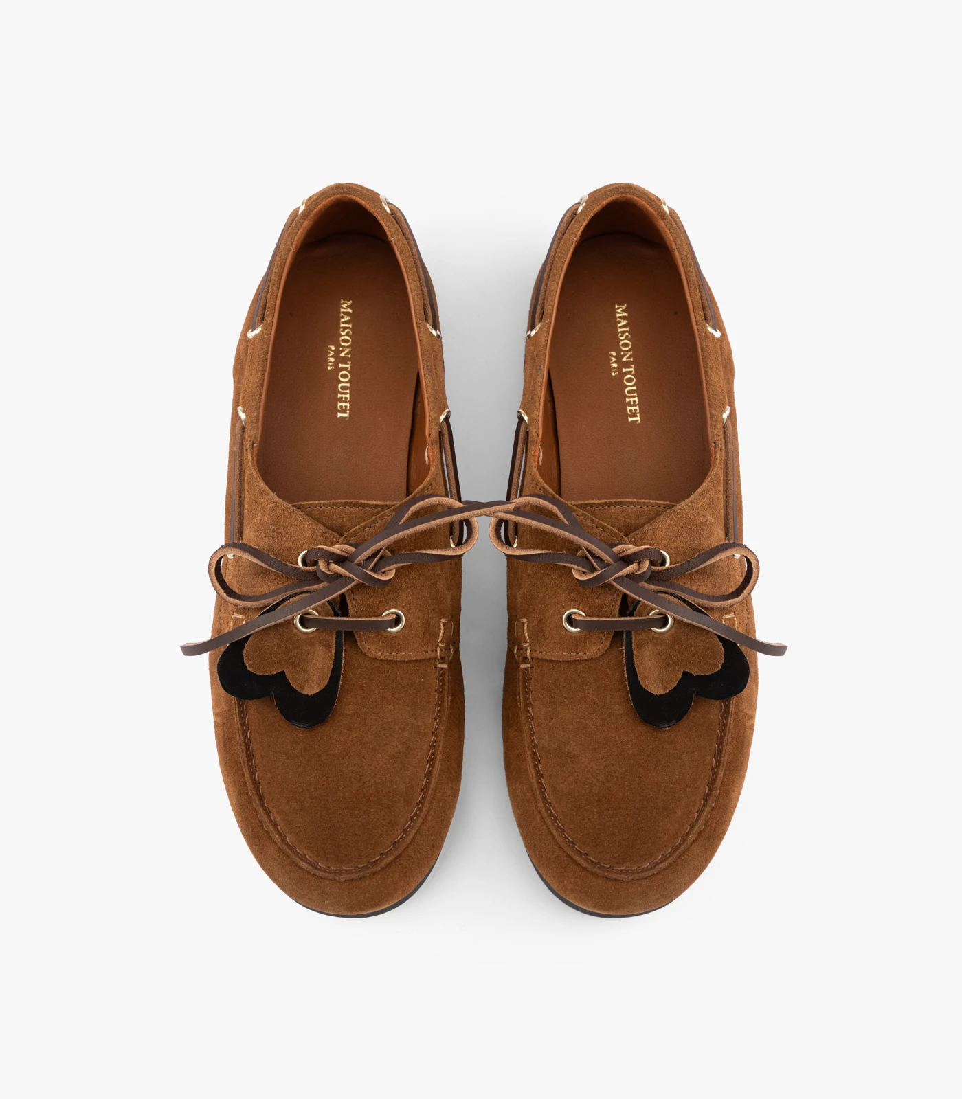 Maison Toufet patent leather loafers for women on a light background