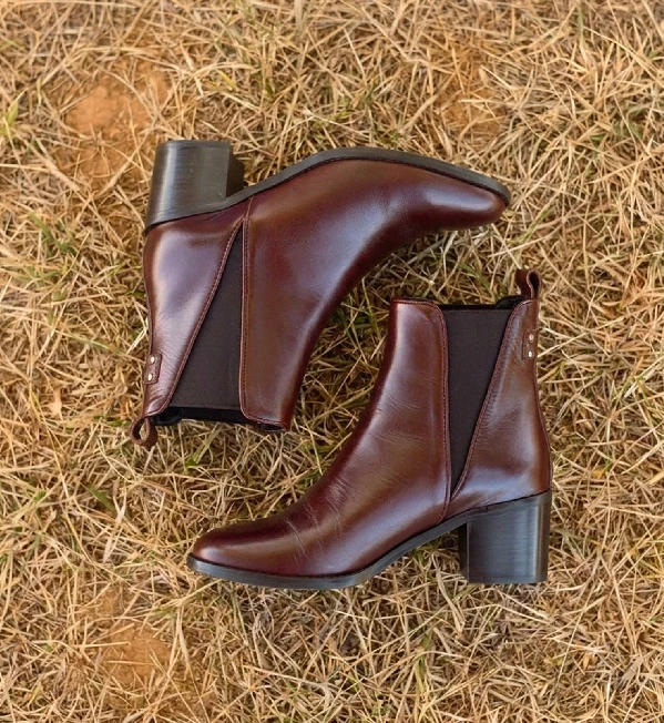 Brown Maison Toufet sneakers worn outdoors